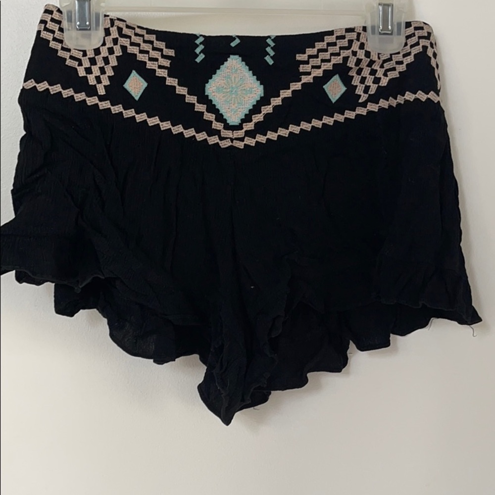black shorts with patterned high waist